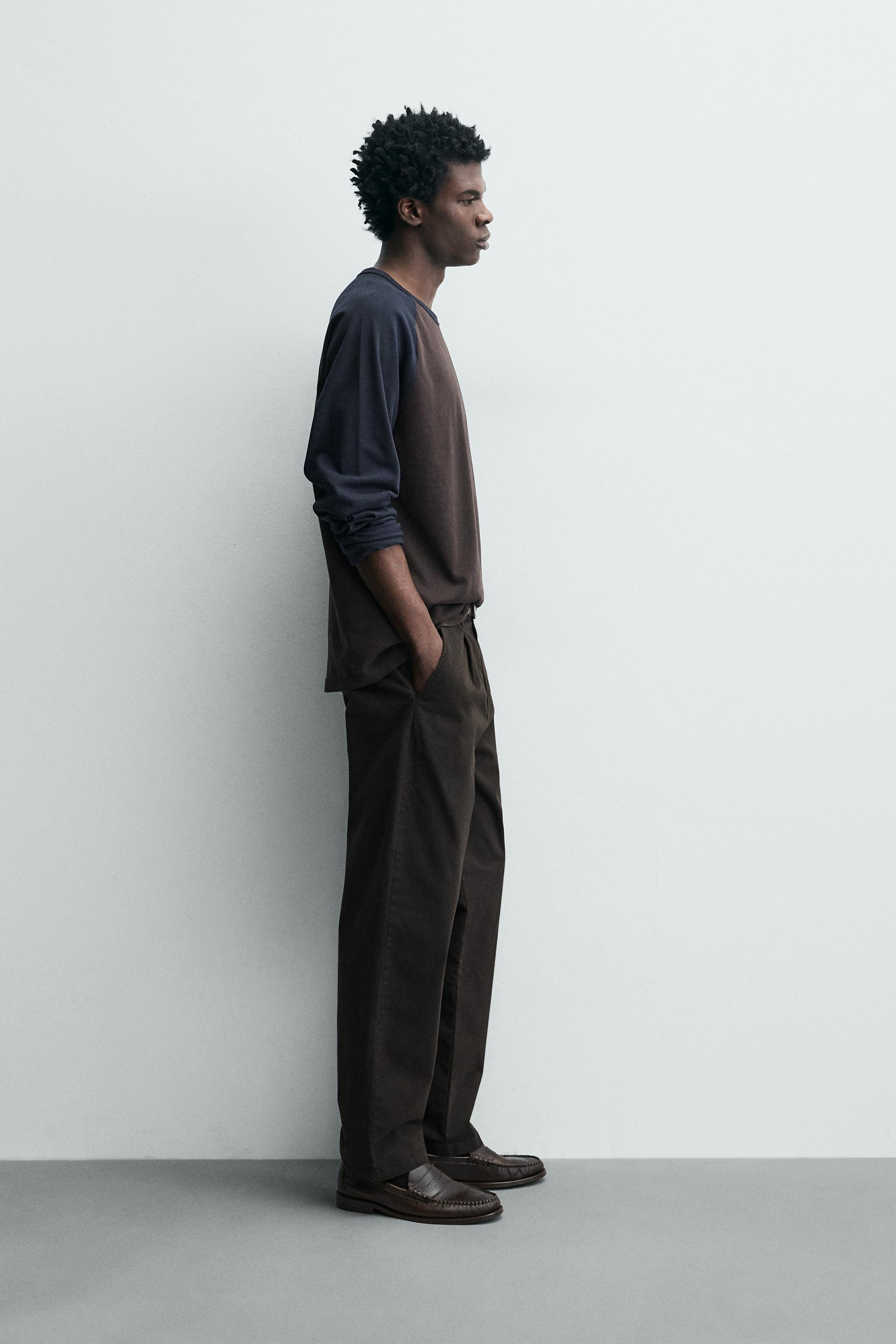 RELAXED FIT PLEATED PANTS